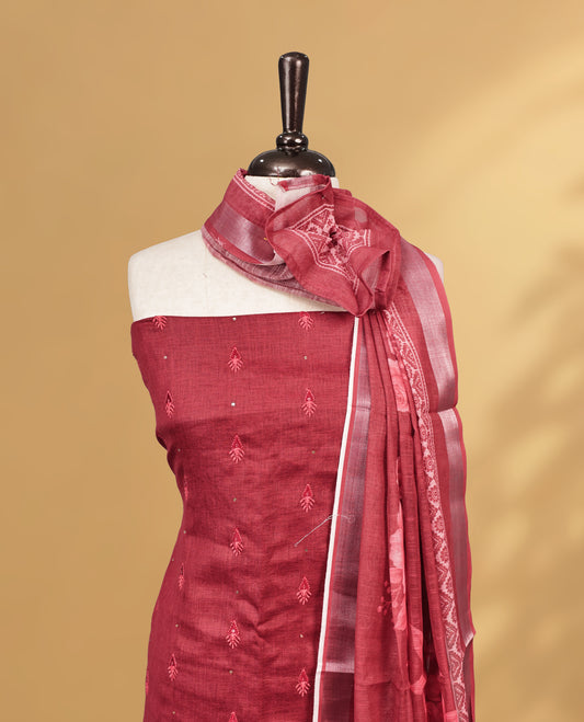 Maroon Colour Salwar material Featuring Embroidery work on body, paired with Matching Bottom and same Patterned Dupatta.