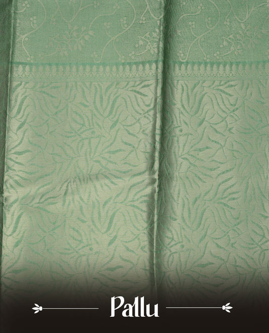 Green colour semi tussar silk saree, featuring an intricate gold zari floral kodi pattern on the body and pallu, comes with matching blouse.