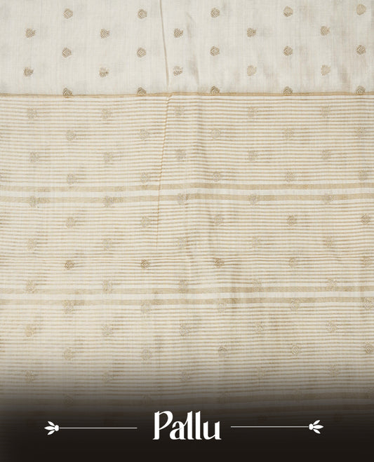Off white gold Tussar saree featuring Gold zari buttas on body, complemented by self colour with traditional border, comes with matching blouse piece.