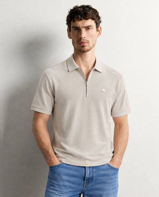 Cream colour Tshirt featuring Collar design neck, plain body and Half sleeve.