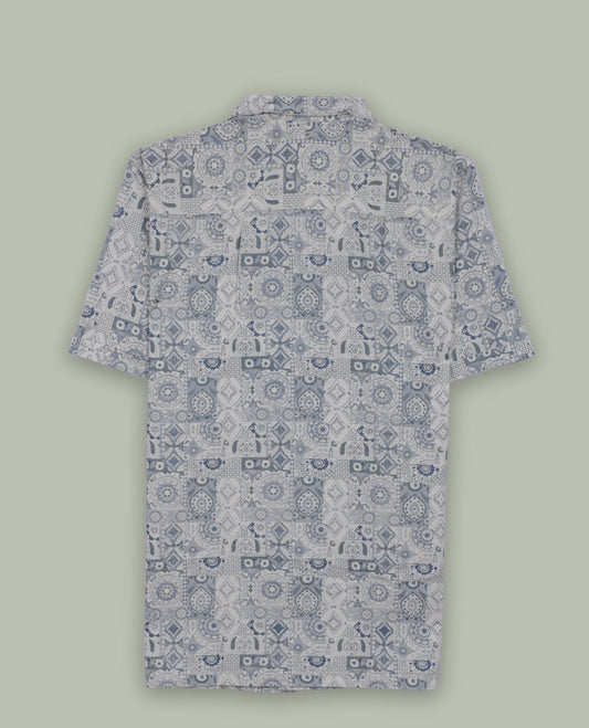 Cream colour short sleeve shirt features a rounded spread collar and a featuring an intricate blue and grey geometric tile design & its ideal for both casual days and laid back evenings.