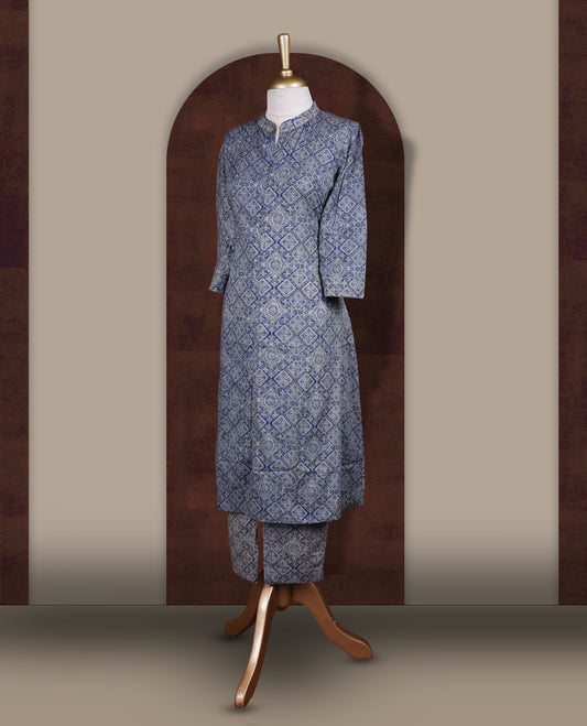 Dusky blue colour cord set with geometric white prints, Features a straight fit kurta with a mandarin collar, button down front, and 3/4 sleeves, paired with matching straight pants for a stylish ethnic look.