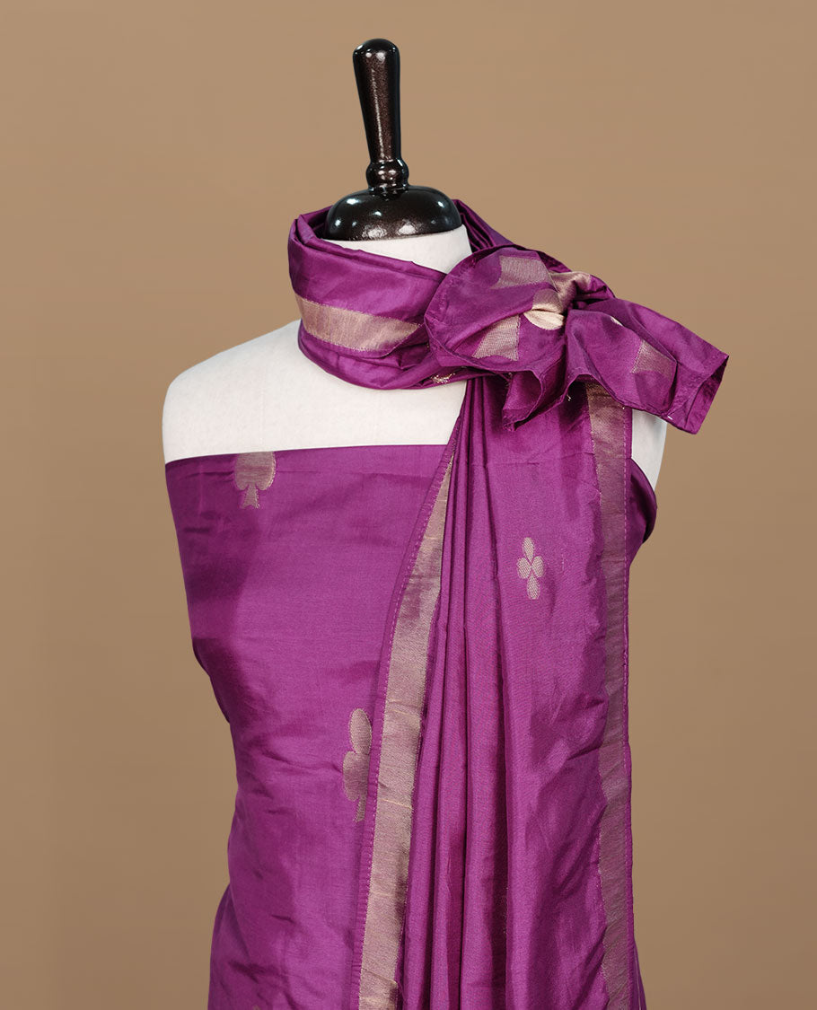Purple colour churidar materal featuring gold zari card pattern on body, border, paired with matching bottom and dupatta.