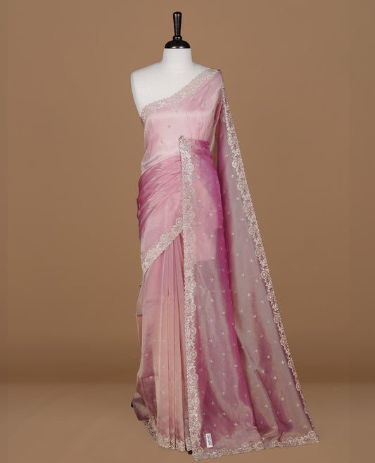 Pinkish purple colour designer saree featuring stone worked body, stone worked border, paired with matching blouse piece.