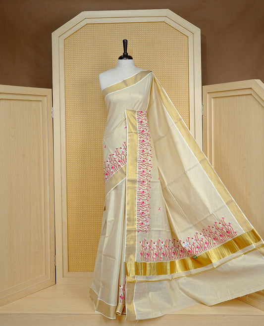Cream colour Tissue kerala saree featuring Embroidery buttas on body, complemented by Floral thread work & kasavu kara, comes with matching blouse piece.