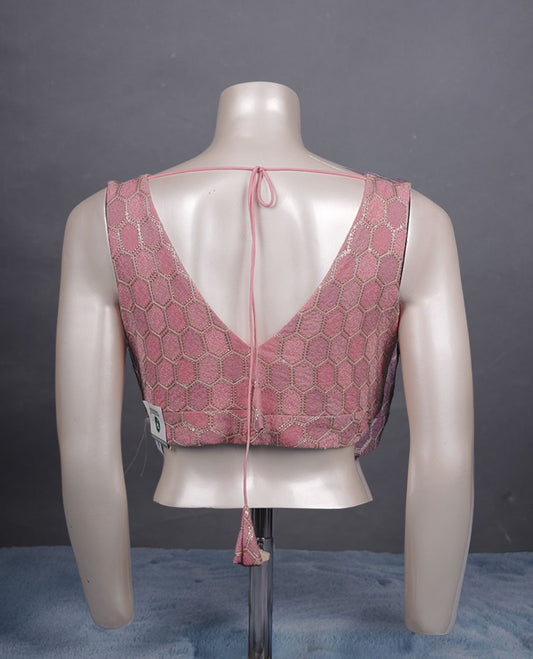 Light pink peach colour padded blouse with gold hexagon weave, sleeveless V-neck, and deep V-back with tie-up tassels.