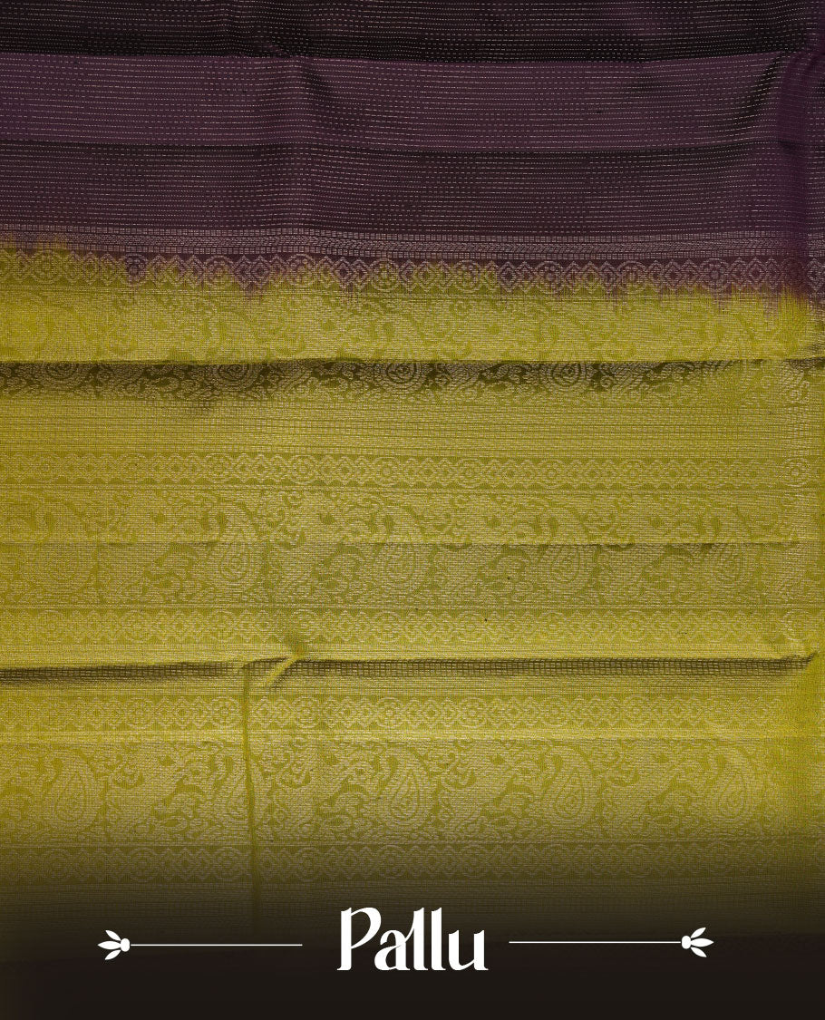 Jamun fruit colour soft silk saree featuring rain drop stripes on body, complemented by contrast henna green with peacock buttas border, paired with matching blouse piece.