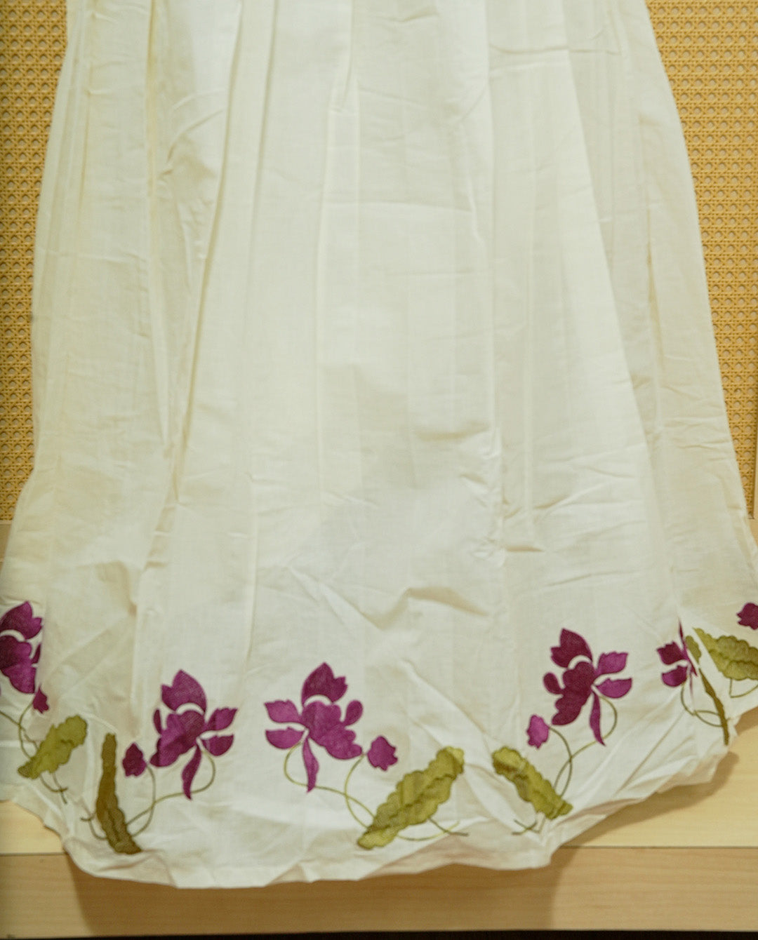 Cream colour cotton Stitched Skirt With Purple colour floral & Leaf kodi thread pattern border.