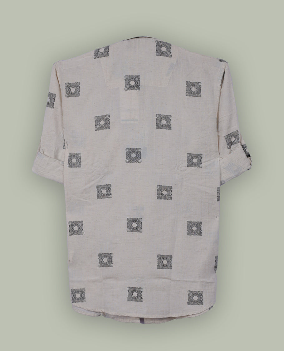 Off white colour shirt adorned with minimal black geometric square prints, Features a classic collar, full sleeves, and a front pocket & perfect for a relaxed yet refined casual look.