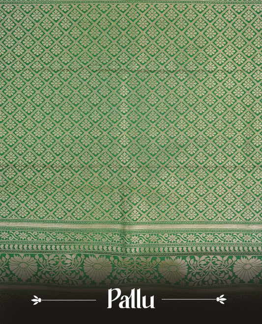 Green colour semi wedding saree featuring gold zari check with  motifs on body complemented by Self colour with traditional border, comes with matching blouse piece.