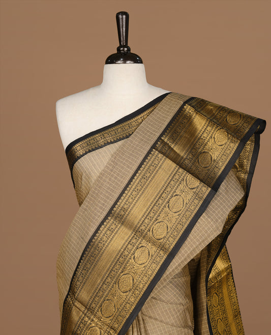 Grey Beige colour Chettinad cotton saree featuring Check pattern on body , complemented by contrast Black colour with zari border, comes with matching blouse piece.