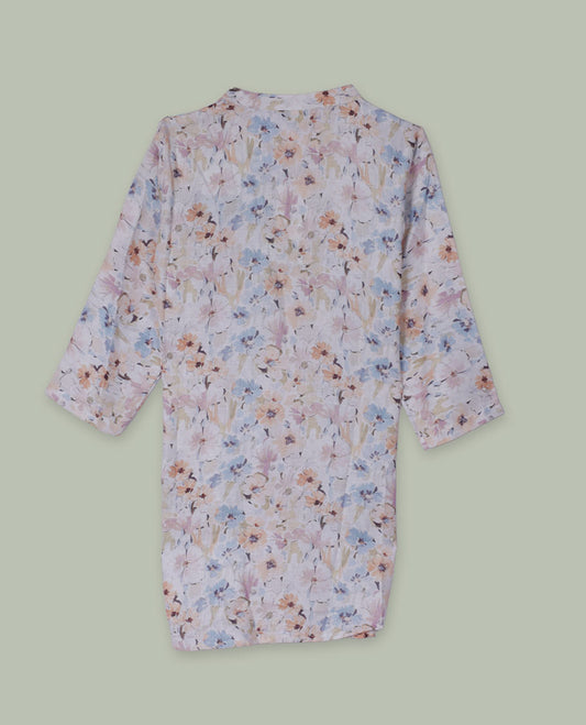 Pastel floral printed tunic top with band collar, pintuck-detailed front, half button placket, and three-quarter sleeves.