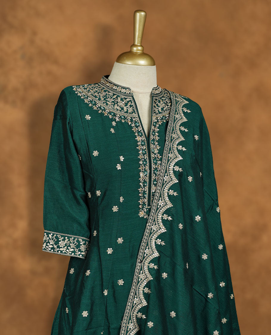 Dark Green colour churidar set featuring thread and embroidered and beats pattern neckline, sleeves, and thread embroidery on body , Paired with a matching dupatta