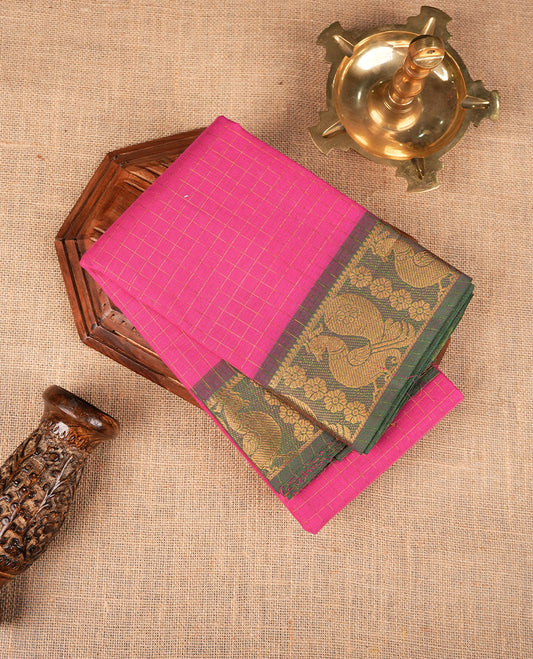 Magenta colour sungudi cotton saree featuring gold zari check pattern across body, contrast green colour with gold zari peacock and floral pattern on border, without blouse piece.