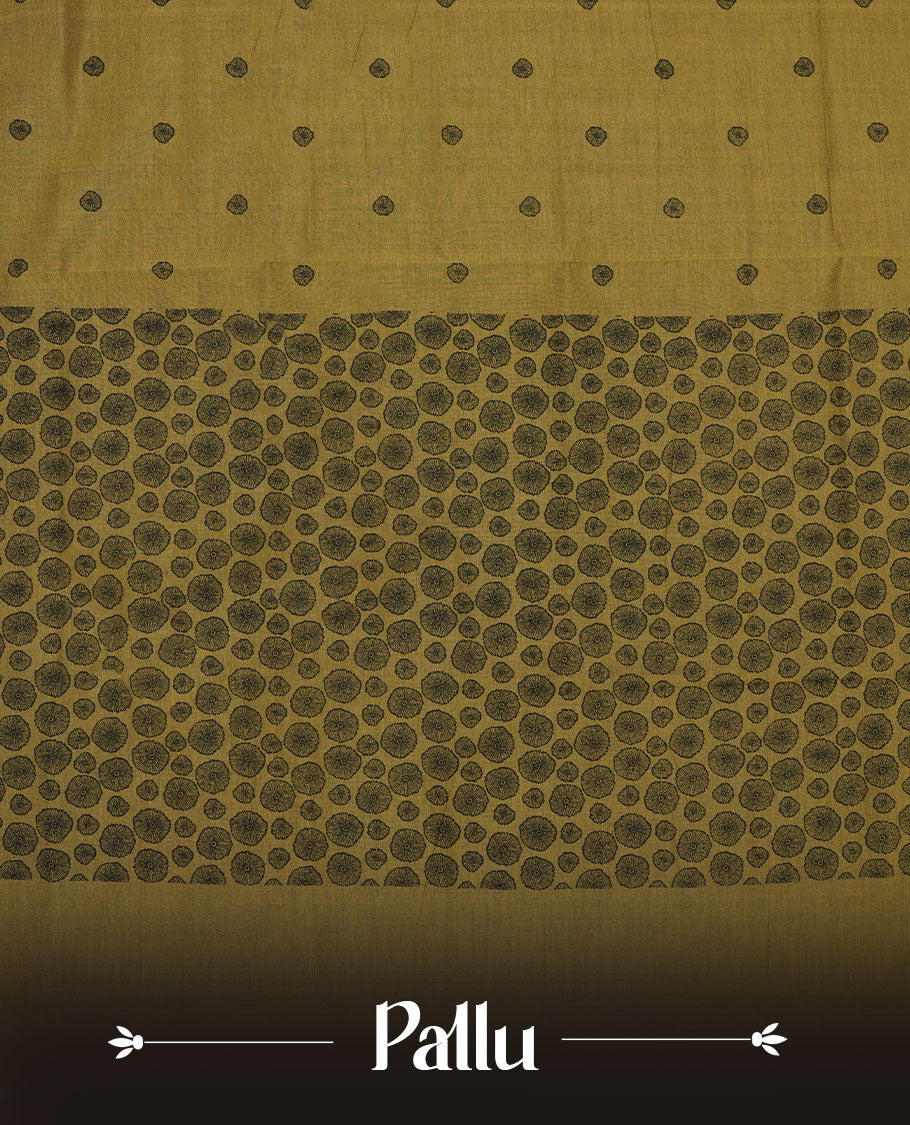 Olive green colour poly cotton saree with black abstract butti motifs on the body, paired with a matching pallu with dense black textured round butta pattern, and a coordinated all‑over textured round butta printed blouse piece.