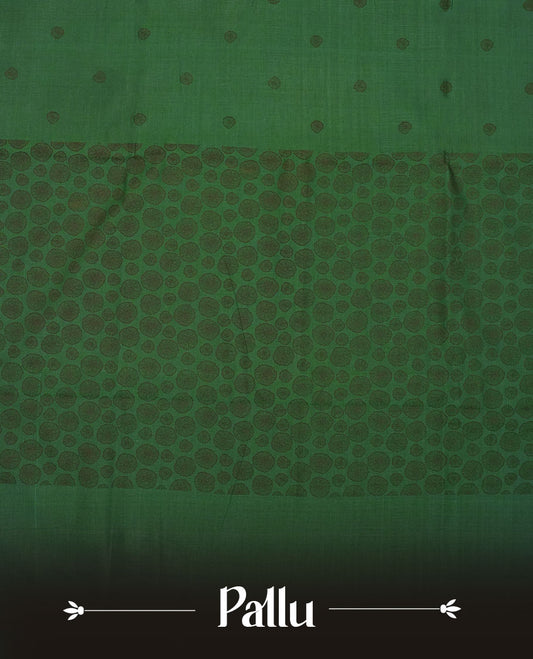 Dark green colour poly cotton saree with black abstract butti motifs on the body, paired with a matching pallu with dense black textured round butta pattern, and a coordinated all‑over textured round butta printed blouse piece.