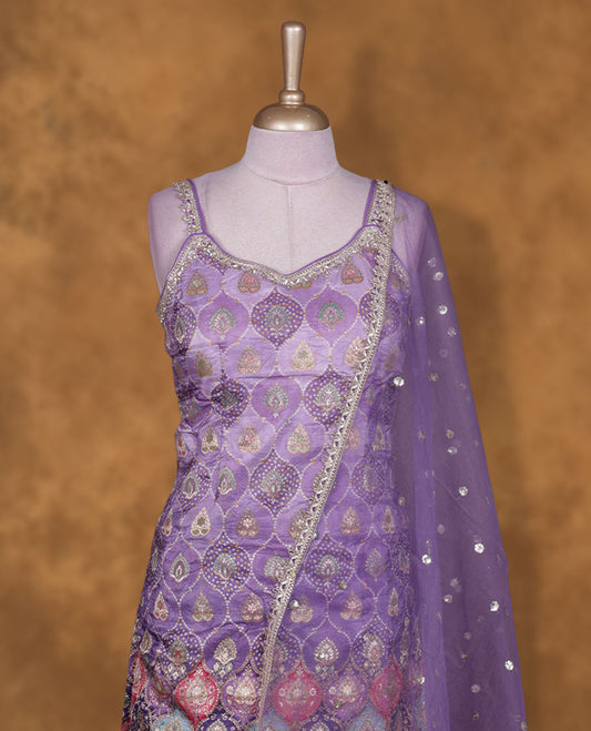 violet colour sharara set adorned with intricate light gold embroidery and sequins work & The fitted embellished top pairs beautifully with the flared bottoms and matching dupatta.