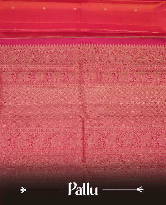 Orange and pink double shade pure traditional Kancheepuram silk saree adorned with elegant zari peacock and chakra motifs on the body, complemented by a simple contrast zari woven border, paired with a matching blouse piece.