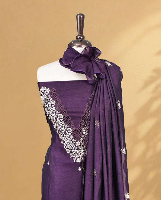 Purple colour Salwar Material Featuring Cream colour Thread pattern on Neckline & Small Buttas, paired with matching bottom & Same Colour Dupatta.
