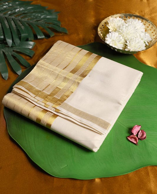 Traditional ivory white pure handloom cotton double dhoti, designed with elegant golden zari stripes and border, offering timeless grace and unmatched comfort for festive and formal occasions.