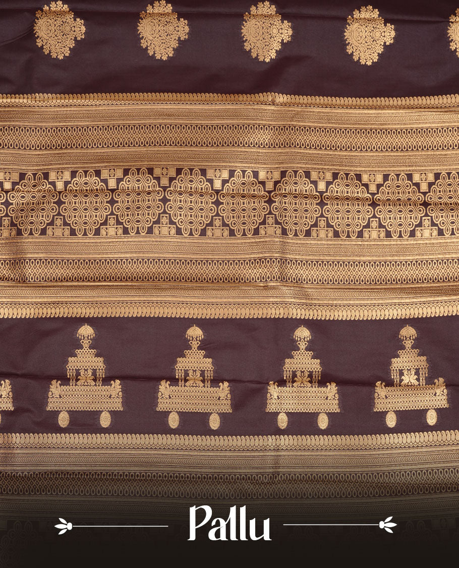 Dark chocolate colour soft silk saree featuring Gold zari motifs on body, complemented by self colour with traditional border, paired with matching blouse piece.