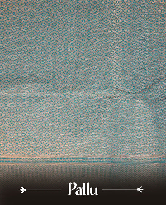 Teal blue colour semi soft silk brocade saree featuring delicate gold woven motifs across the body, enhanced with a self-colour intricately designed border and pallu, paired with a matching blouse piece.