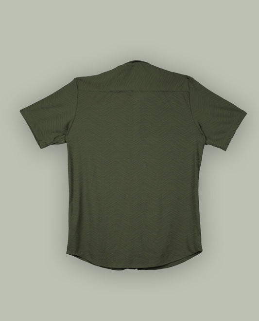 Pastel olive green colour textured shirt featuring a subtle chevron pattern, classic collar, and short sleeves & Crafted for effortless comfort and style.