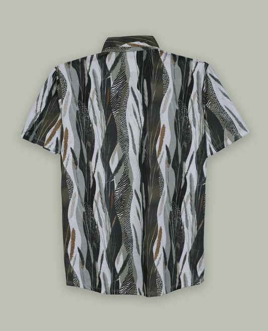 Green, black, and white shirt features a classic spread collar and short sleeves, Its bold feather like print and lightweight fabric make it perfect for casual wear or tropical getaways.