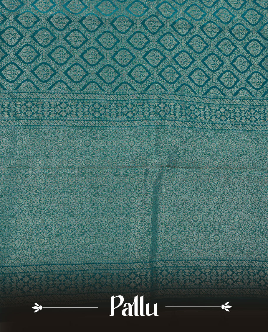 Aqua Blue colour banaras satin crepe saree featuring gold zari pattern across body, with self colour border with gold zari pattern and paired with matching blouse.