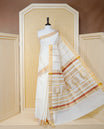 Cream Colour Cotton Kerala Saree Featuring an Elegant Plain Body, a Classy Gold Zari Border, and a Traditional Gold Zari Pallu with Maroon Accents, Paired with a Matching Blouse Piece.