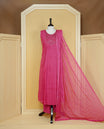 Mauve pink colour pleated churidar set featuring intricate bead and sequin embroidery on the yoke, paired with matching solid pants and dupatta.
