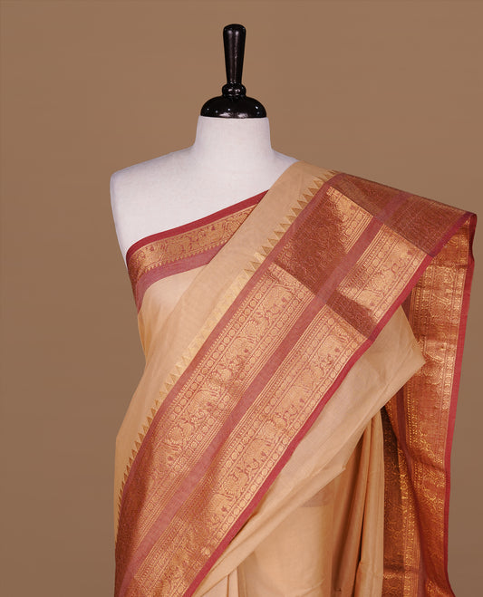 Sandalwood Colour Chettinad cotton saree featuring elegant plain body , complemented by contrast Brickred colour with traditional border, comes with matching blouse piece.