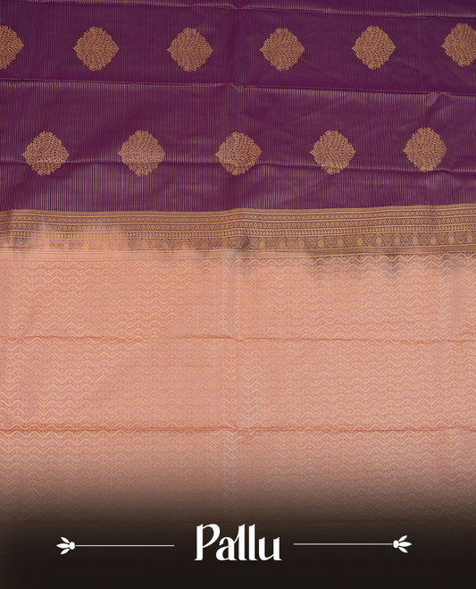 Purple colour semi silk saree highlighting gold zari strip pattern  and motifs across body, featuring contrast lavender colour border with gold zari pattern, comes with matching blouse .