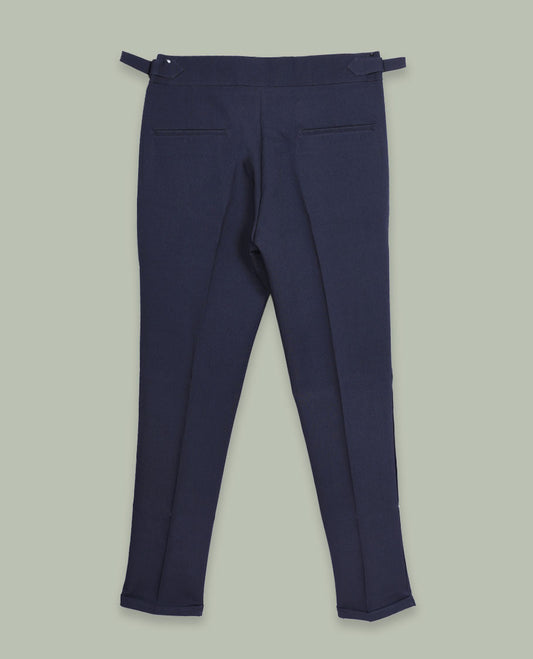 Navy blue colour men’s pant featuring a clean waistband with side buckle adjusters, neat front pleats, slant pockets and back welt pockets, finished with a straight leg fit.