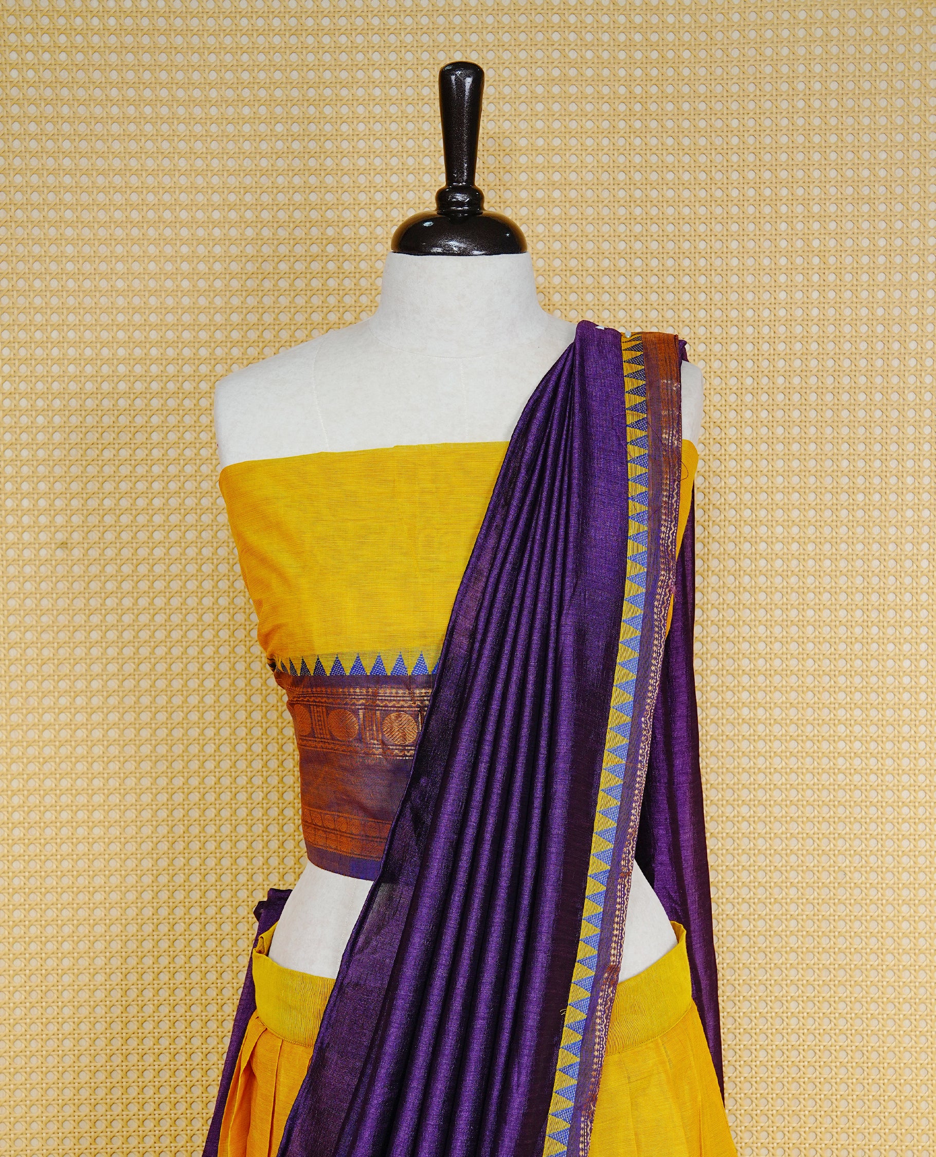 Lemon colour Semi Stitched Dhavni set Featuring Lemon Skirt With Contrast Purple colour with Zari border, paired with UnStitched Blouse & Elegant Dupatta.