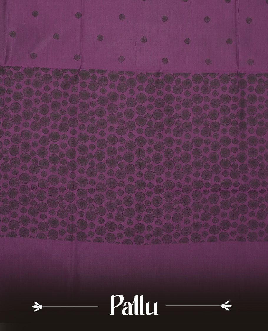 Grape Purple colour poly cotton saree with black abstract butti motifs on the body, paired with a matching pallu with dense black textured round butta pattern, and a coordinated all‑over textured round butta printed blouse piece.