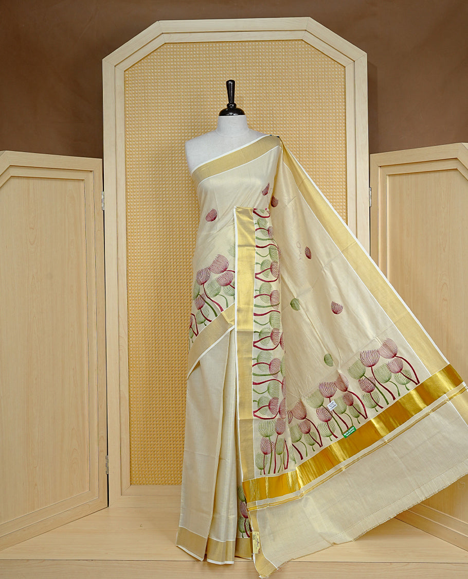 Cream colour Tissue kerala saree featuring Embroidery buttas on body, complemented by Plant thread work & kasavu kara, comes with matching blouse piece.