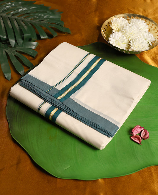 Ivory white pure cotton double dhoti designed with an elegant teal and gold zari border, blending traditional charm with breathable comfort, perfect for festive and cultural occasions.