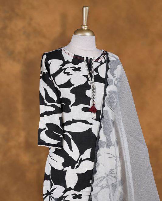 Black & white colour churidar set featuring thread & cut beats embroidered on neckline, sleeves, and Floral print 85732on body , Paired with a matching dupatta