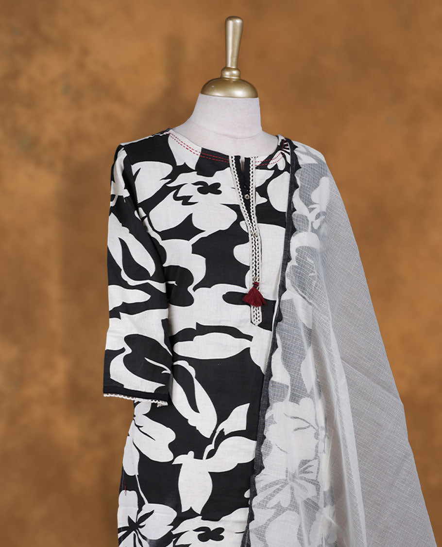 Black & white colour churidar set featuring thread & cut beats embroidered on neckline, sleeves, and Floral print 85732on body , Paired with a matching dupatta