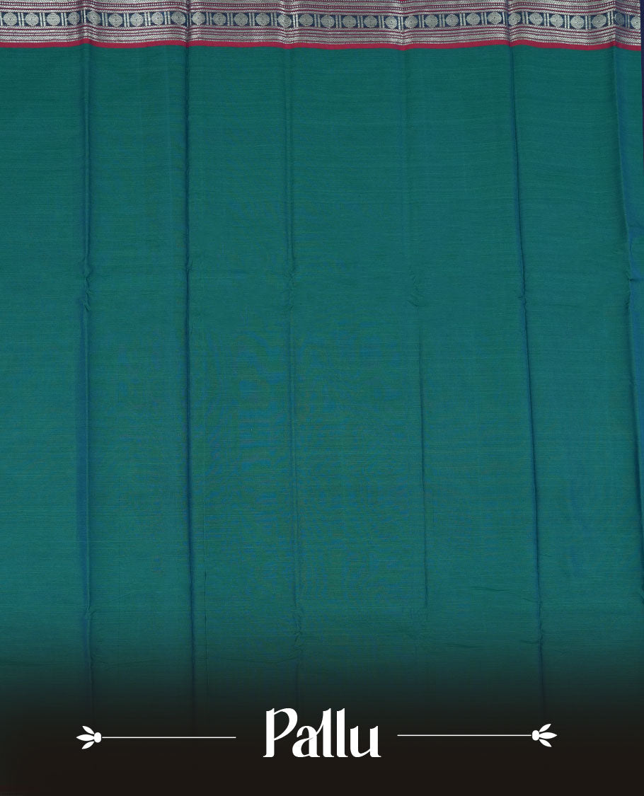 Peacock colour Narayanapattu cotton saree featuring a self coloured body, contrast deep red colour with silver zari border and pallu, pairing a matching blouse piece.