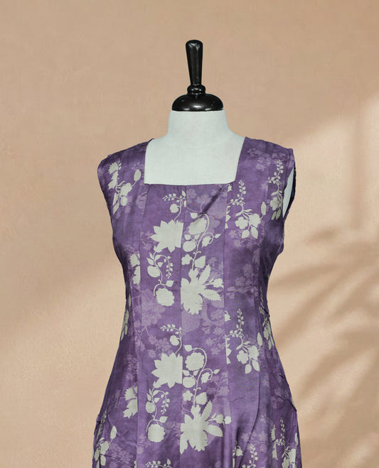 Purple Colour Kurti featuring Light Brown Colour Floral Prints on the body, a square neckline with a clean fitted yoke, sleeveless design