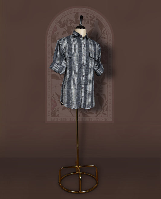 Charcoal black colour cotton linen blended shirt featuring self striped detailing and a breathable textured weave, Designed with double flap chest pockets, roll up sleeves, and a button-down front.
