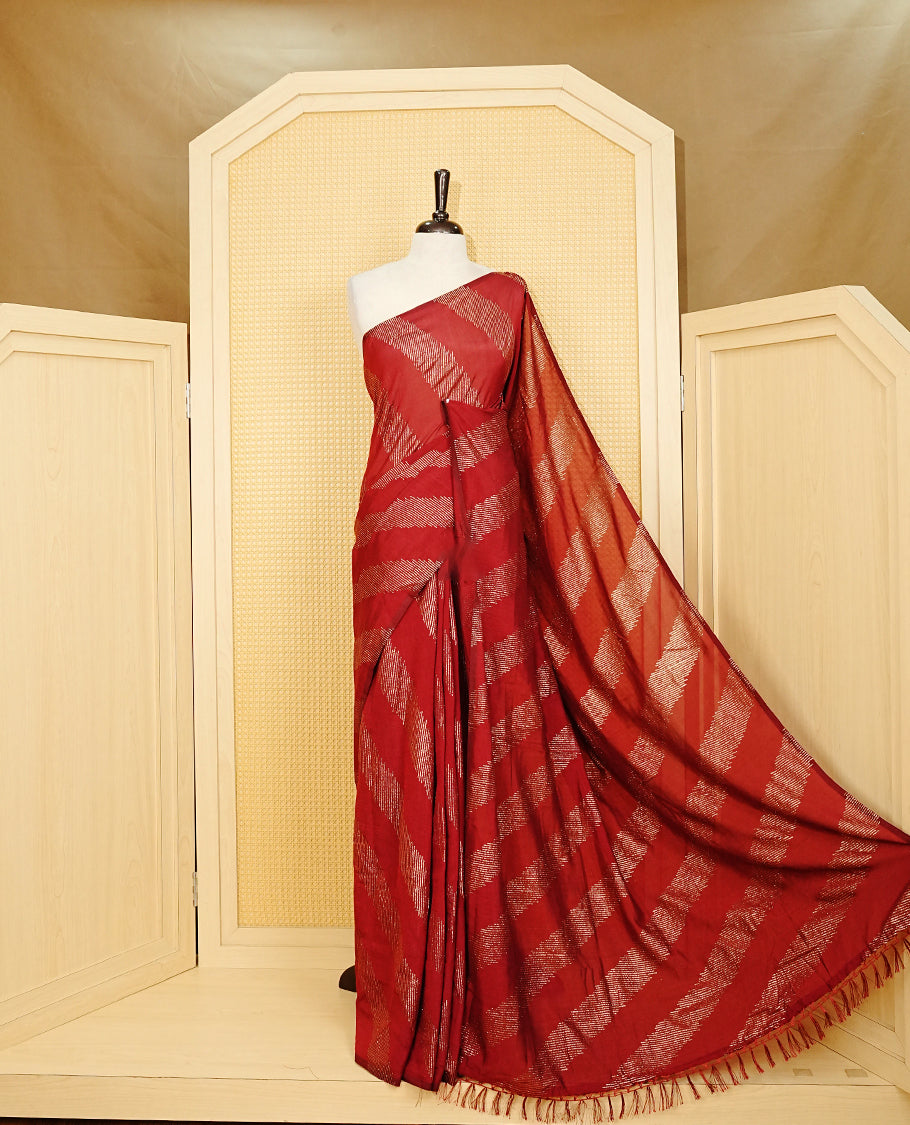 Maroon colour Vijitra silk Saree Featuring Leheriya style gold Printed body, complemented by contrast pallu & tassels