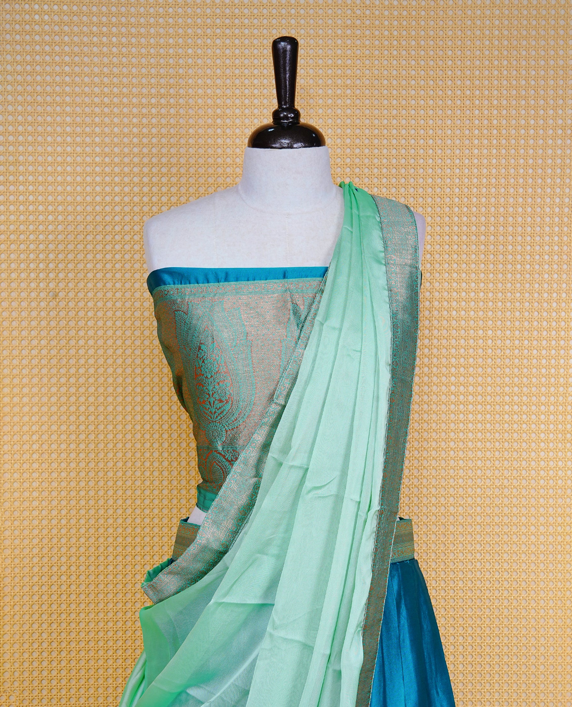 Teal Green colour Half saree featuring Plain skirt with Zari border on contrast Light green colour border, Unstitched Blouse and matching dupatta.