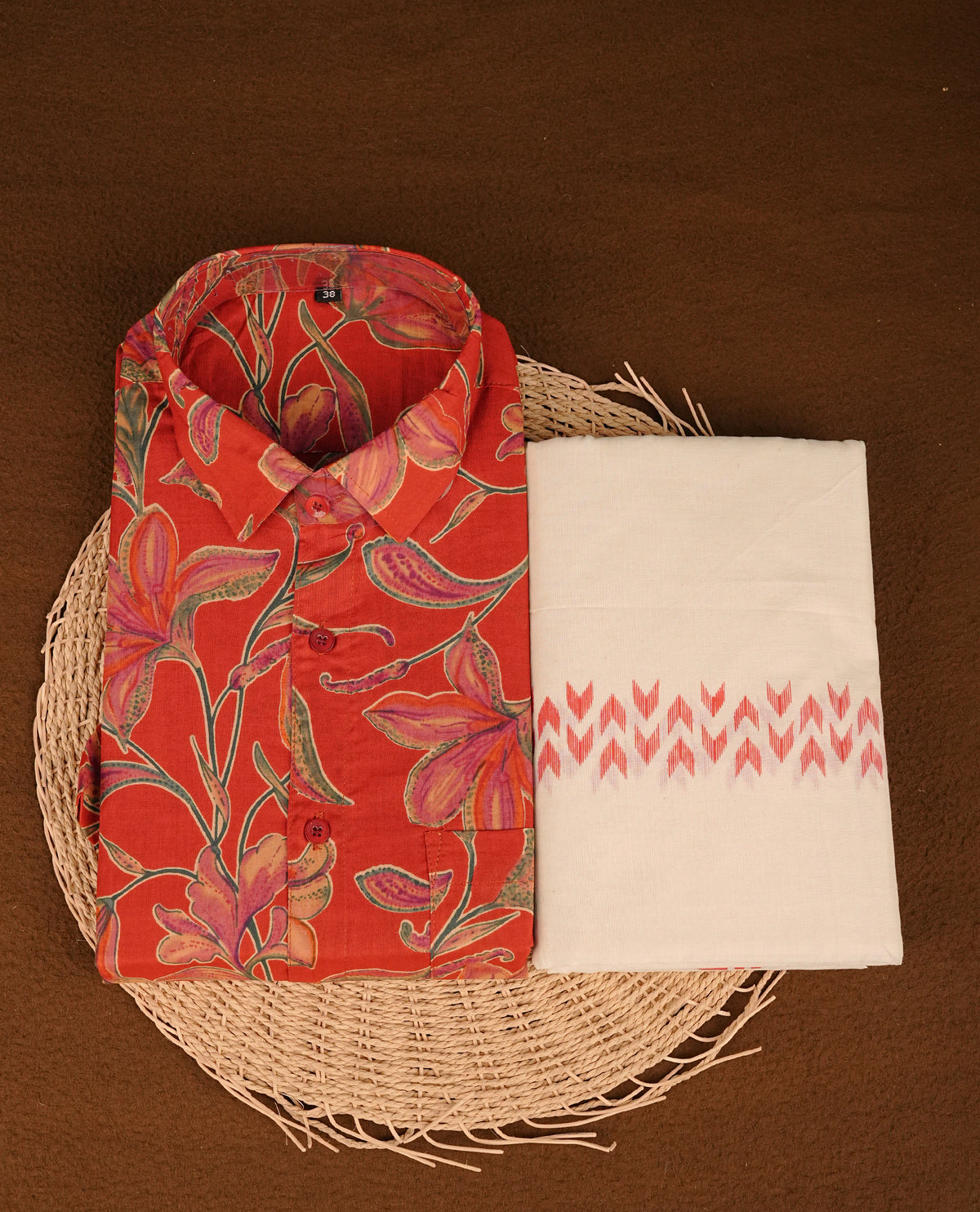 Dark Red colour shirt featuring Floral Pattern printed body, paired with cream colour double dhoti featuring Arrow printed border.