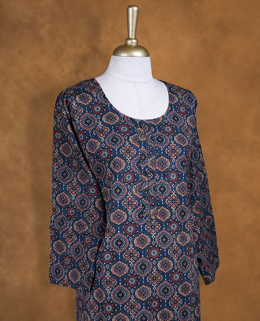 Ash blue colour kurti with styled with  a printed pattern across body, knee length design, and a sleeve .