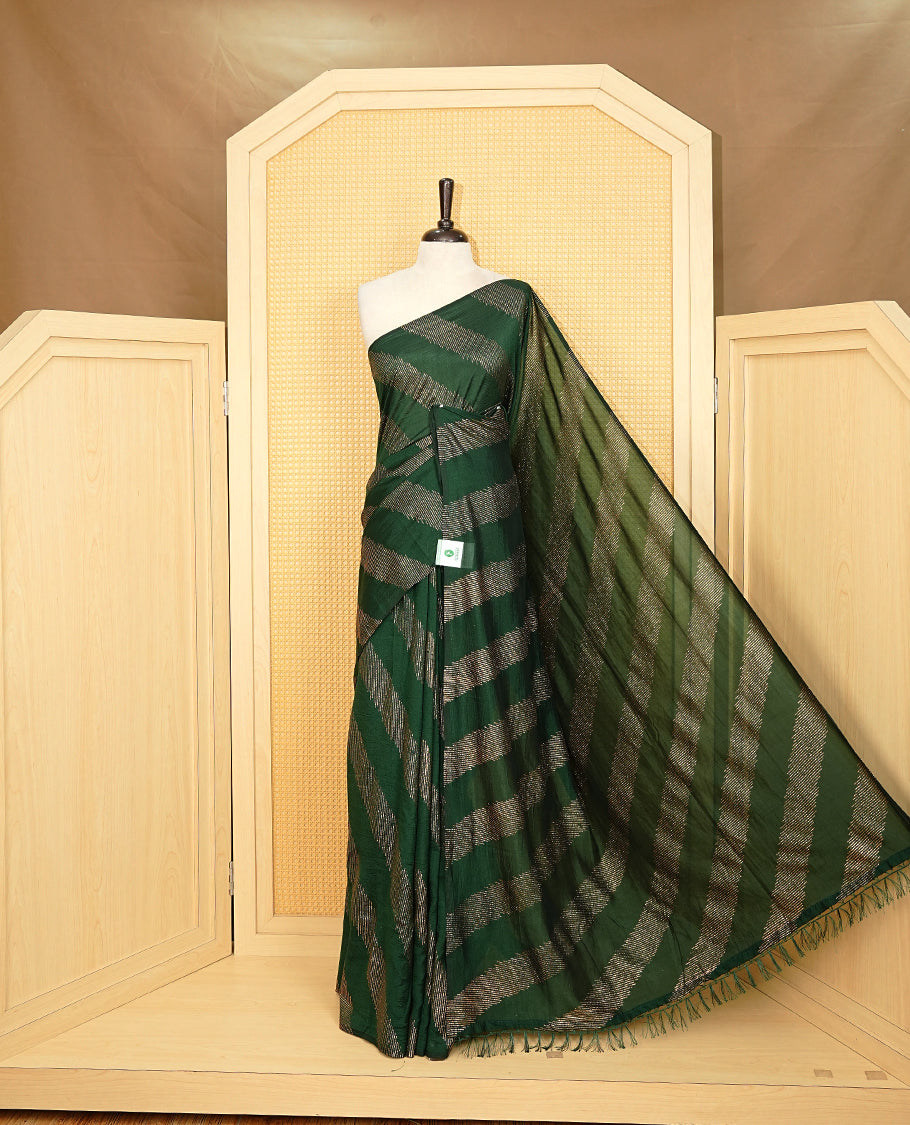 Green colour Vijitra silk Saree Featuring Leheriya style gold Printed body, complemented by contrast pallu & tassels