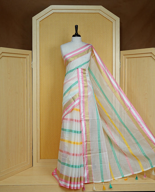 Cream colour Cotton kerala Saree featuring Pink, Gold zari and green colour striped body, Elegant borderless, comes with matching blouse piece.