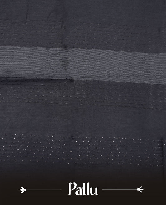 Dark blue colour semi jute saree highlighting white thread motifs on body, without border and paired with matching blouse.